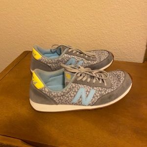 New Balance 410 women size 6.5 blue gray yellow